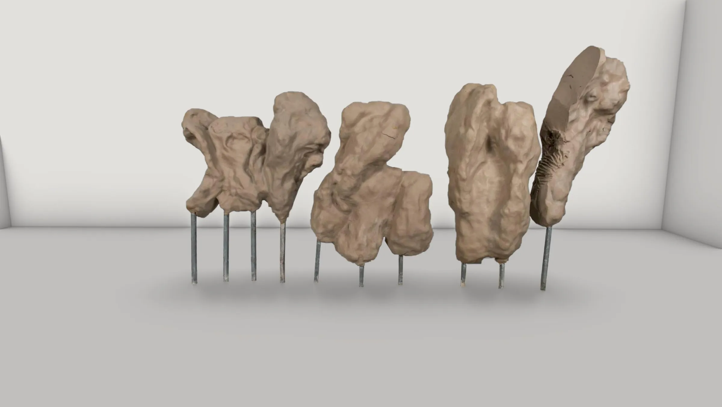Model study of the sculptures on open supports that meet the floor directly.