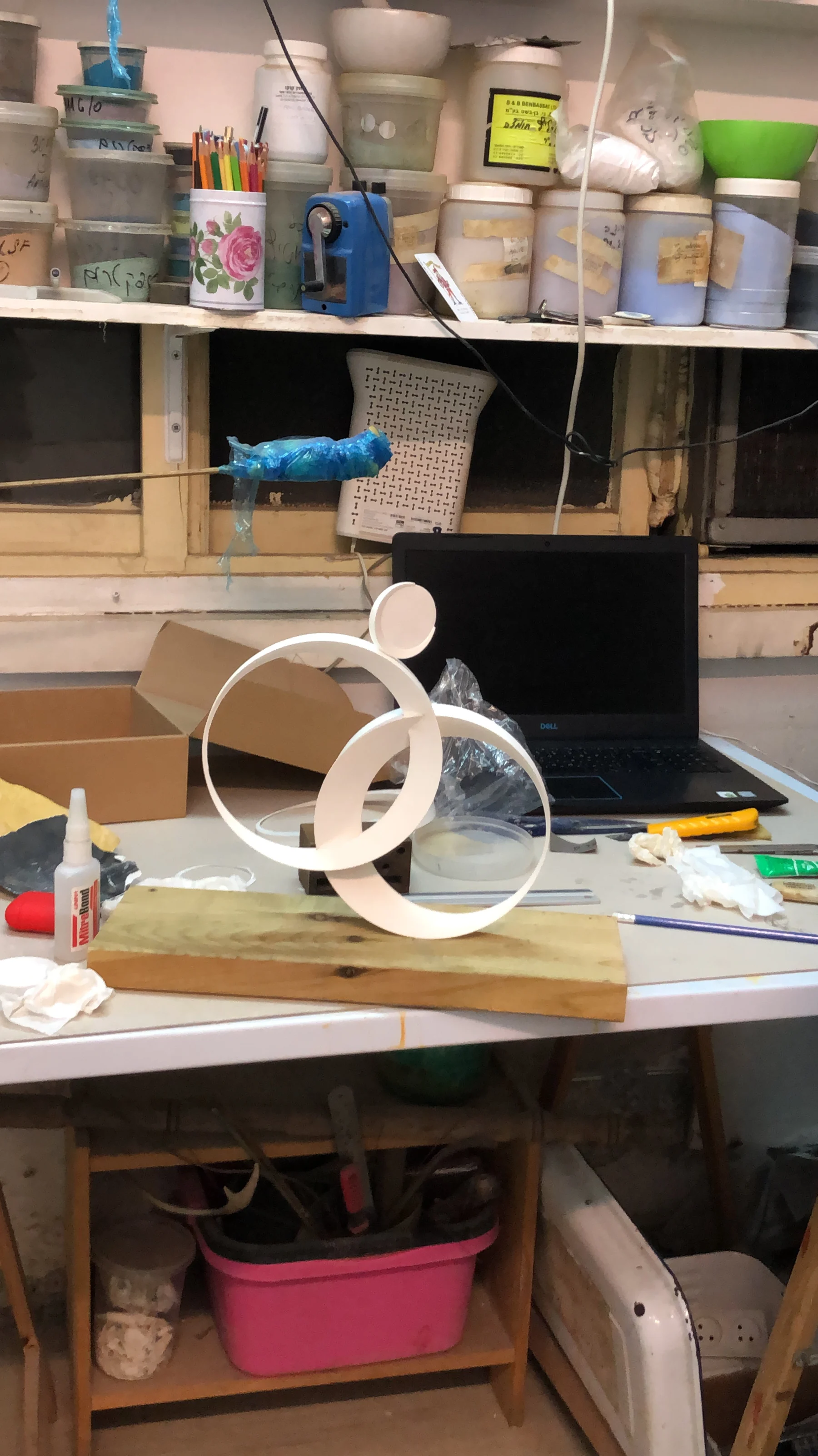 Physical study model of Luna’s rings on a workshop table.